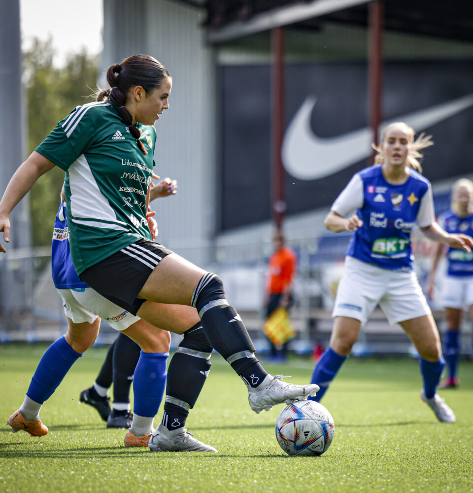 Vifk women footballers playing football with JyPK players in Vaasa Lemonsoft stadium.