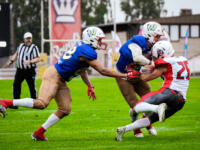 20230728 Vaasa, FINLAND. VAAHTERALIIGA: Wasa Royals - United Newland Crusaders Lohja.
Royals #13 Tim Morovick thuds Crusaders #25 Dante Edwards out of his way.
Photo: Samppa Toivonen / APOLLO PHOTO