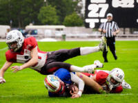 20230728 Vaasa, FINLAND. VAAHTERALIIGA: Wasa Royals - United Newland Crusaders Lohja.
Royals #13 Tim Morovick scores touchdown, Crusaders #21 Aleksi Riiheläinen & #4 Seth Rowland defending.
Photo: Samppa Toivonen / APOLLO PHOTO