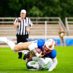 20230811 Vaasa, FINLAND. VAAHTERALIIGA: Wasa Royals - Seinäjoki Crocodiles.
Wasa Royals #13 Tim Morovick slides over Seinäjoki Crocodiles #44 Aatu Tuokko.
Photo: Samppa Toivonen / APOLLO PHOTO