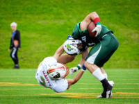 20230902 Seinäjoki, FINLAND. VAAHTERALIIGA: Seinäjoki Crocodiles - Wasa Royals.
Wasa Royals #2 Viktor Mänty taking down Seinäjoki Crocodiles #1 Ville Ollonqvist.
Photo: Samppa Toivonen / APOLLO PHOTO