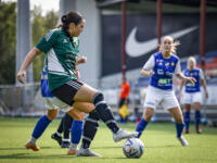 Vifk women footballers playing football with JyPK players in Vaasa Lemonsoft stadium.