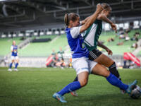 Vifk women footballers playing football with JyPK players in Vaasa Lemonsoft stadium.