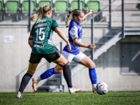 Vifk women footballers playing football with JyPK players in Vaasa Lemonsoft stadium.