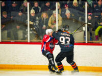 20231017 Uusikaarlepyy, FINLAND. SUOMI-SARJA: MuIK Hockey Munsala - Järvenpään Haukat.
Haukat #93 Aapo Malinen going against MuIK #21 Tobias Åkerman.
Photo: Samppa Toivonen / APOLLO PHOTO
