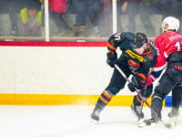 20231017 Uusikaarlepyy, FINLAND. SUOMI-SARJA: MuIK Hockey Munsala - Järvenpään Haukat.
Haukat #10 Jere Kivinen hits MuIK #12 Carl-Axel Brasken.
Photo: Samppa Toivonen / APOLLO PHOTO
