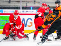 20231020 Vaasa, FINLAND. U20 SM-Sarja: Vaasan Sport - Kouvolan KooKoo.
KooKoo #34 Verneri Ahonen scoring, Sport #41 Artur Seniut ttying to block the shot.
Photo: Samppa Toivonen / APOLLO PHOTO