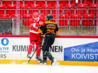 20231020 Vaasa, FINLAND. U20 SM-Sarja: Vaasan Sport - Kouvolan KooKoo.
Sport #98 Valtteri Haataja hits KooKoo #28 Niilo Suvanto.
Photo: Samppa Toivonen / APOLLO PHOTO