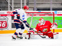 20240105 Vaasa, FINLAND. U20 SM-Sarja: Vaasan Sport - Helsingin IFK.
HIFK #16 Anton Kyynäräinen Sport #53 Masi Härkönen maalilla.
Photo: Samppa Toivonen / APOLLO PHOTO