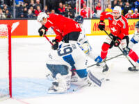 20251106 Tampere, FINLAND. EURI HOCKEY TOUR: Team Switzerland - Team Finland.
Team Finland #29 Harri Säteri stops puck and Team Switzerland #17 Ken Jäger
Photo: Samppa Toivonen / APOLLO PHOTO