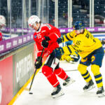 20251108 Tampere, FINLAND. EURI HOCKEY TOUR: Team Sweden - Team Switzerland.
Team Sweden #15 Simon Ryfors cross-checking Team Switzerland #95 Tyler Moy
Photo: Samppa Toivonen / APOLLO PHOTO