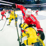 20251108 Tampere, FINLAND. EURI HOCKEY TOUR: Team Sweden - Team Switzerland.
Team Switzerland #56 Tim Berni showing Team Sweden #40 Andreas Wingerli
Photo: Samppa Toivonen / APOLLO PHOTO