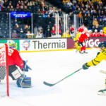 20251108 Tampere, FINLAND. EURI HOCKEY TOUR: Team Sweden - Team Switzerland.
Team Sweden #29 Axel Andersson tries to deflect at Team Switzerland #26 Sandro Aeschiliman
Photo: Samppa Toivonen / APOLLO PHOTO