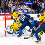 20251109 Tampere, FINLAND. EURI HOCKEY TOUR: Team Finland - Team Sweden.
Team Sweden #75 Arvid Holm stops Team Finland #65 Sakari Manninen
Photo: Samppa Toivonen / APOLLO PHOTO