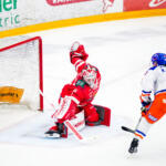 20251219 Vaasan Sähkö Areena Vaasa, FINLAND. LIIGA: Vaasan Sport - Tampereen Tappara.
Tampereen Tappara #22 Aapeli Räsänen scores on Vaasan Sport #1 Masi Härkönen
Photo: Samppa Toivonen / APOLLO PHOTO